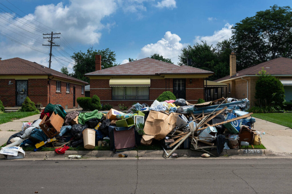 Eviction scene; Belongings from house are on the curb