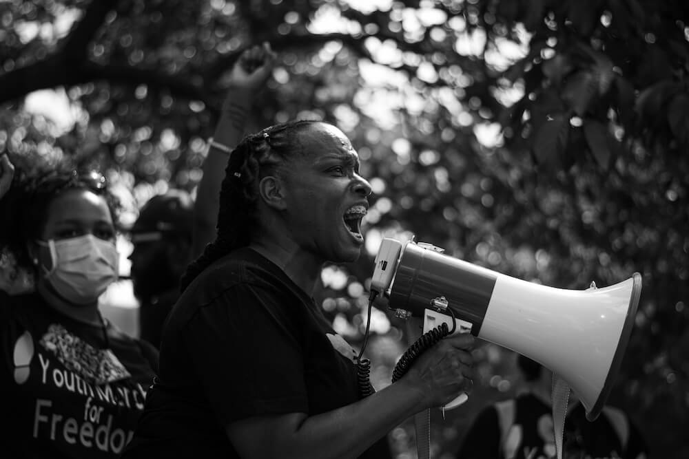 Rep. Attica Scott participates in Youth led peaceful protest marching in downtown Louisville Kentucky 7/4/2020