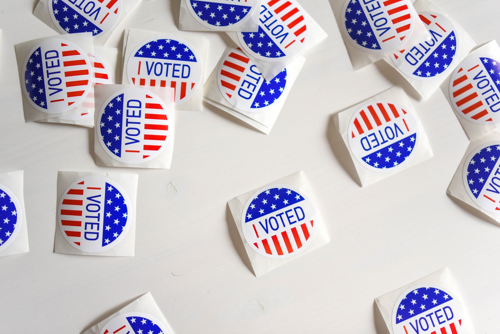 Pile of "Voted" stickers with American flag