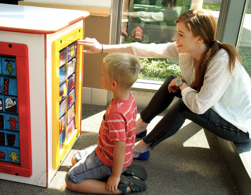 mallory mcmorrow playing with kid