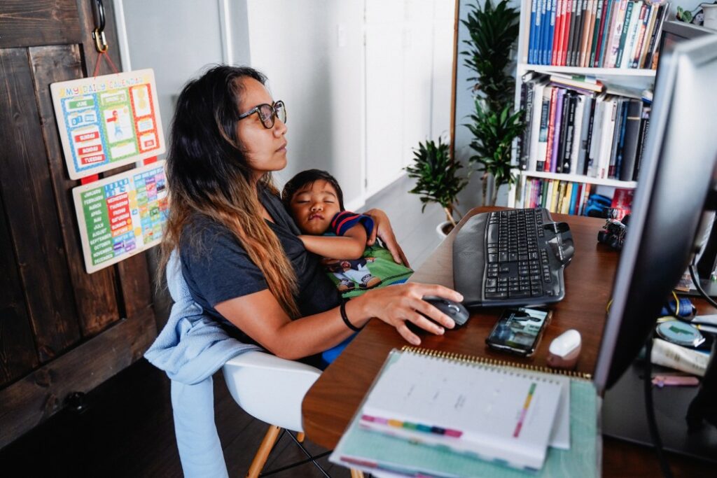 Asian mother and son working from home office